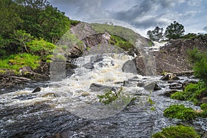 Closeup on waterfall on Owenreagh River, running through Molls Gap in MacGillycuddys Reeks mountains
