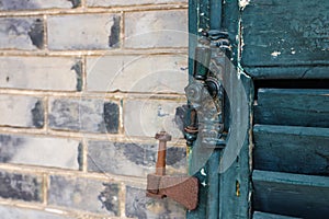 Closeup of the weathered details on the scratched door of British consul residence building in Wuhu photo