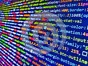 Closeup of Web Code on Computer LED Screen. HTML code on laptop screen. Closeup of Java Script, CSS and HTML. Programmer