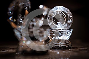 Closeup of a wedding ring in a crystal box