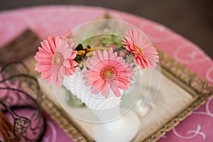 Closeup of wedding table in pink tones. The design of the guest table in rustic style.