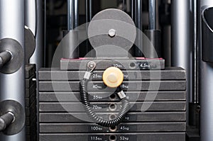 Closeup of weight stack equipment of weightlifting machine