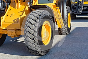 closeup of a wheel of earth moving machine