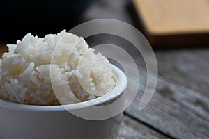 closeup of a white bowl with rice
