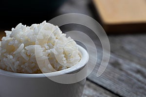 closeup of a white bowl with rice photo