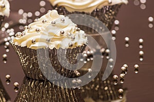 Closeup of a White Cupcake with Silver Sprinkles