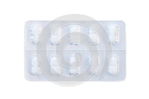 Closeup of white medicine pills in an unused blister pack