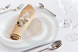 Closeup white place setting