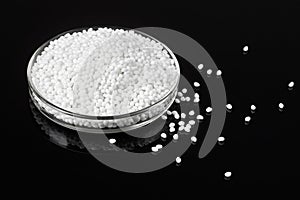 Closeup of a white plastic polymer in granules