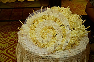 Closeup white and yellow Sandalwood flowers for a funeral ceremo