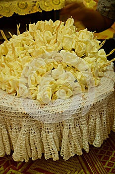 Closeup white and yellow Sandalwood flowers for a funeral ceremo