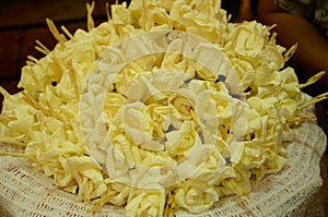 Closeup white and yellow Sandalwood flowers for a funeral ceremo