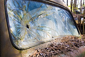 Closeup windshield of an old rustic truck.