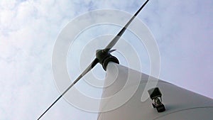 Closeup of Wing Turbine Generator against clody sky