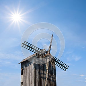 Closeup winmill on sunny sky background photo
