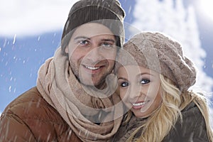 Closeup winter portrait of loving couple