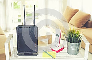 Closeup of a wireless router on living room at home