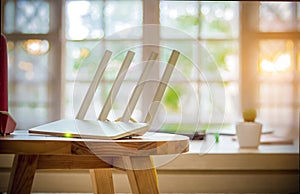 Closeup of a wireless router on living room at home