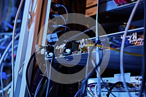 Closeup wires and cables in dark server room