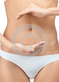 Closeup of woman belly photo