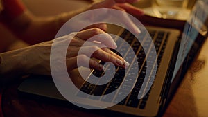 Closeup woman browsing laptop online on business trip. Hands typing keyboard.