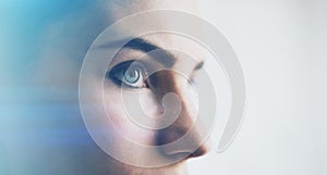 Closeup of woman eye with visual effects, on white background. Horizontal