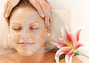 Closeup of woman getting head massage