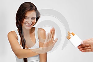 Closeup Of Woman Giving Up Smoking Cigarettes. Health Concept