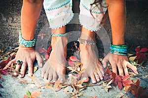 Closeup of woman hands and feet practice yoga