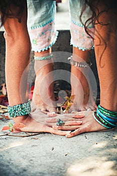 Closeup of woman hands and feet practice yoga