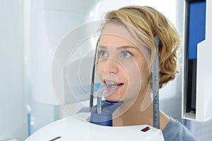 Closeup woman having dental xray