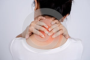 Closeup woman neck and shoulder pain and injury. Health care and medical concept