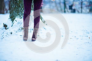 Closeup on woman outdoors in city park in winter