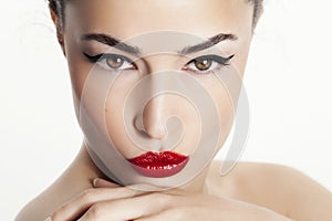 Closeup woman portrait with red lips and black eyeliner