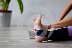 Closeup of woman practicing yoga