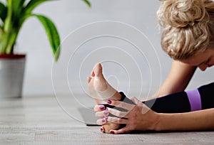 Closeup of woman practicing yoga