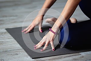 Closeup of woman practicing yoga