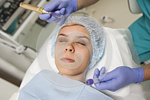 Closeup of a woman recieving microdermabrasion