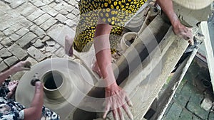 Closeup Woman Rolls out Clay Helps to Make Earthenware Crockery