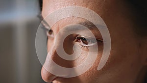 Closeup of woman's face, adult woman has beautiful brown eyes. Portrait of face profile confident young attractive