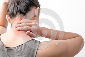 Closeup women neck and shoulder pain/injury with red highlights on pain area with white background, healthcare and medical concept