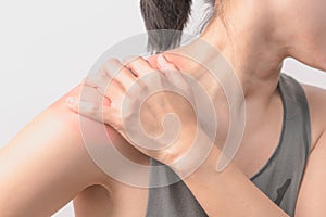 Closeup women neck and shoulder pain/injury with red highlights on pain area with white background, healthcare and medical concept