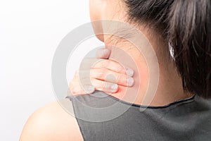 Closeup women neck and shoulder pain/injury with red highlights on pain area with white background, healthcare and medical concept