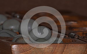 Closeup of a wooden mancala game