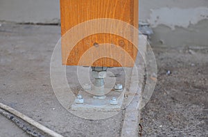 Closeup of wooden pillar or column on the new house construction site with