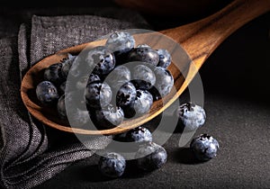 Wooden Spoonful of Fresh Blueberries