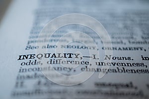 Closeup of the word inequality