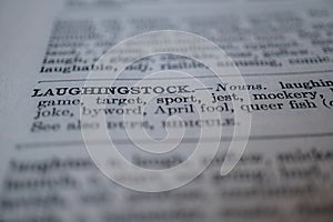 Closeup of the word laughingstock