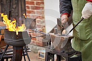 Closeup of a working blacksmith