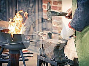 Closeup of a working blacksmith